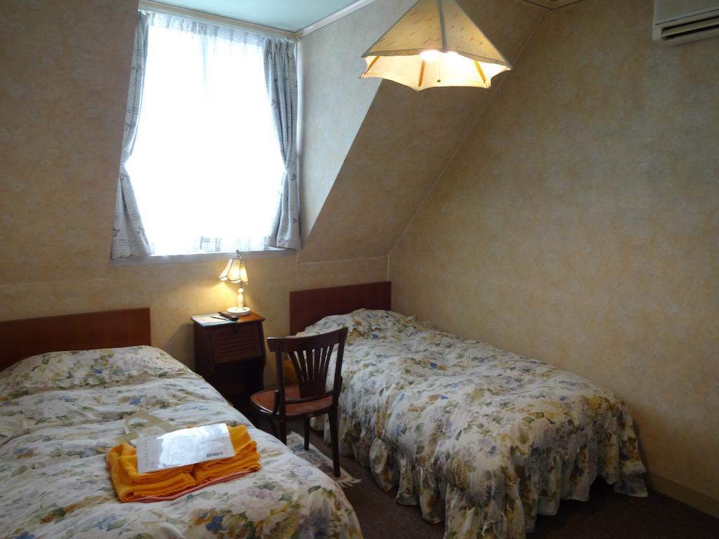 Ishiuchi Pension Bruges Minamiuonuma Camera foto